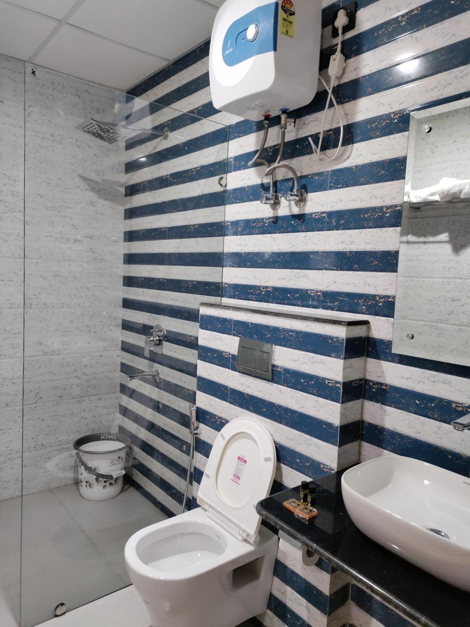 Emerald Suites Грейтър Нойда Стая снимка